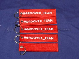 Изготовление двухсторонних вышитых брелков на заказ