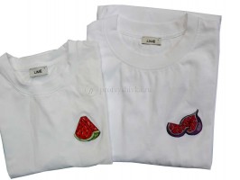 Яркая вышивка ягод и фруктов на одежде