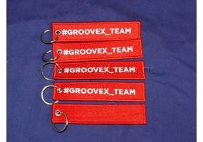 Изготовление двухсторонних вышитых брелков на заказ